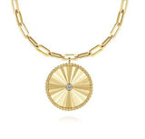 Yellow Gold Textured Medallion on a Hollow Chain