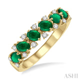 14KY 0.20 CTW Diamond Oval Shape Emerald and Round Cut Diamond Ring