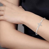 Sterling Silver Flexi Diamond Cross Bangle w/ 0.05 ctw